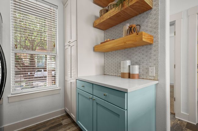 Kitchen with open shelves, tasteful backsplash, dark wood-style flooring, and baseboards | Image 20