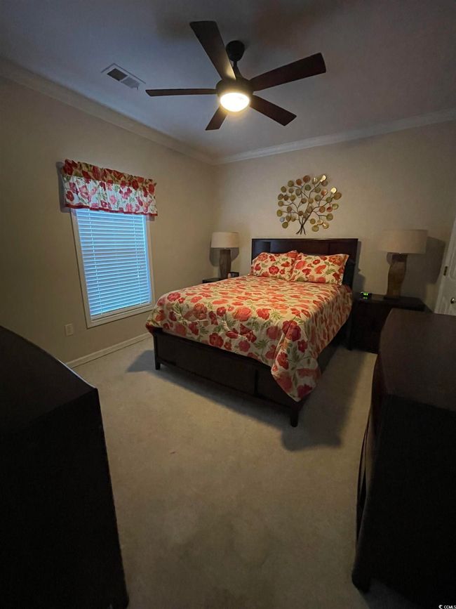 Crown Molding, Xtra Large Closet, Berber Carpeting and Ceiling Fan. | Image 24