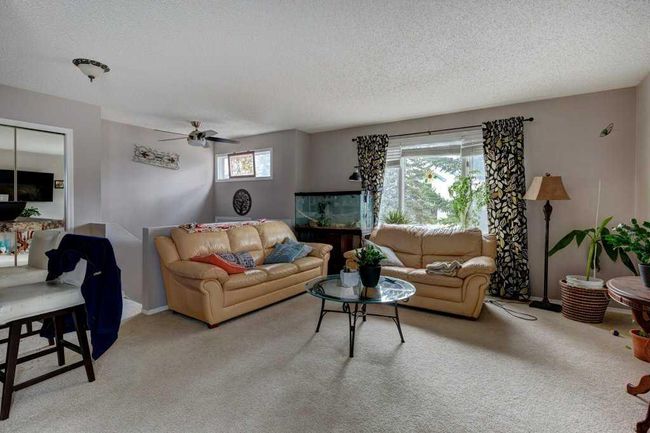 127 Millcrest Way Sw, Home with 4 bedrooms, 2 bathrooms and 2 parking in Calgary AB | Image 2