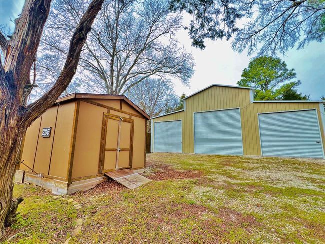 View of outbuilding with an outdoor structure | Image 11