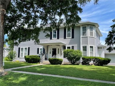 Colonial house featuring a front yard | Image 2