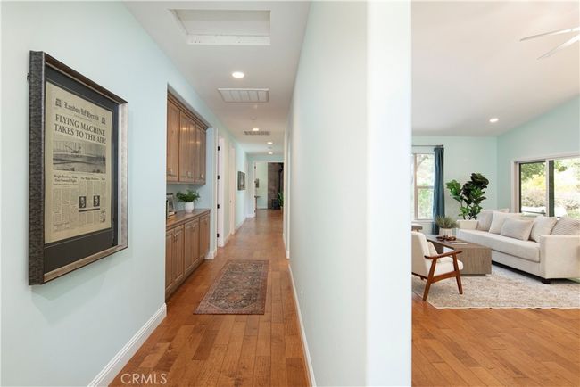 Spacious extra wide hallway leading to the bedrooms and Master Suite | Image 26