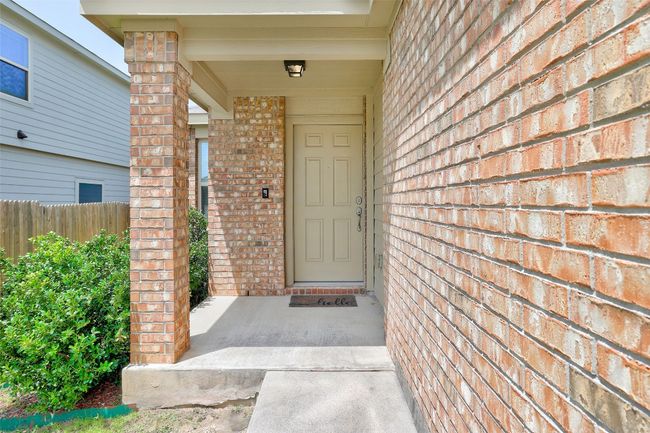Entrance to property with brick siding | Image 4