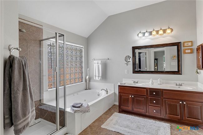 Primary bath: jacuzzi tub, separate shower, double vanity | Image 9