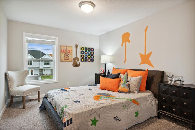 Each of the home's secondary bedrooms on the upper level come perfectly sized and all feature a spacious closet. *Pictures are of model home; Colors and options may vary | Image 14