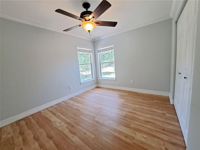 Guest bedroom. Bedroom #2 looks out to the rear yard. Good sized closet. | Image 19