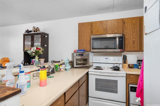 APT-216 - 98-402 Koauka Loop, Condo with 2 bedrooms, 1 bathrooms and 2 parking in Aiea HI | Image 7