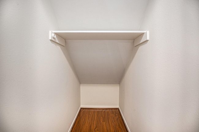 Under stairway storage. | Image 27