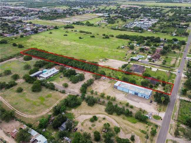 Aerial overview of property's location featuring property parcel outlined | Image 19