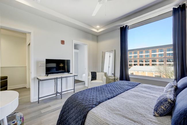 Bedroom featuring wood finished floors, recessed lighting, and ceiling fan | Image 16