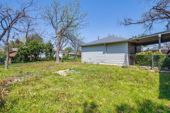 View of yard with fence | Image 23