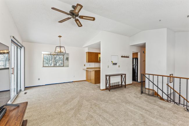 Open and bright living space with vaulted ceiling | Image 9