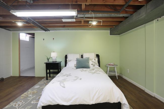 Basement guest room with closet space | Image 17