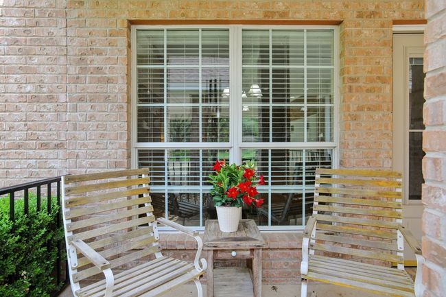 View of exterior entry with brick siding | Image 20