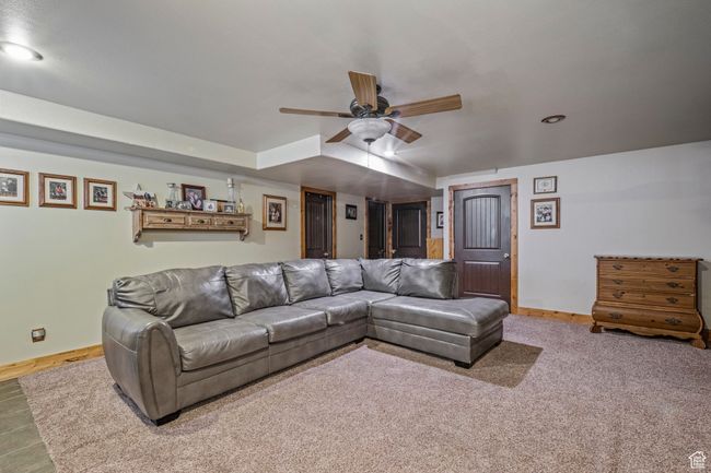 Basement family room with gas fireplace | Image 22