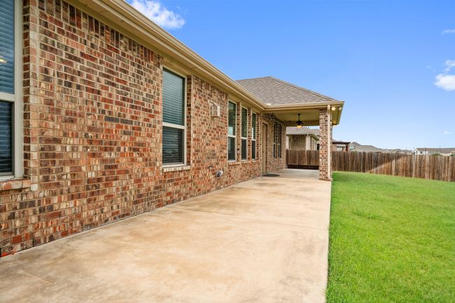 View of patio with a ceiling fan | Image 30