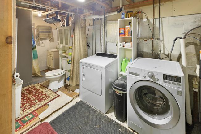 Lower-level laundry and bathroom | Image 19