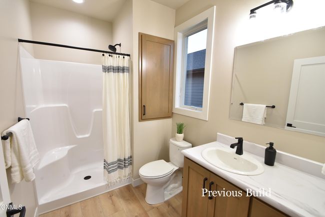 1612 Community Loop, House other with 3 bedrooms, 4 bathrooms and null parking in Bismarck ND | Image 21