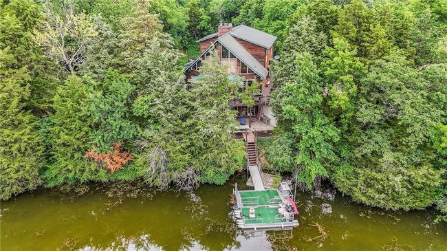 Aerial view of property and surrounding area featuring a nearby body of water | Image 66