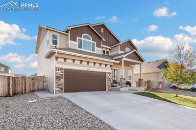 10627 Outfit Drive, House other with 5 bedrooms, 3 bathrooms and 3 parking in Colorado Springs CO | Image 1