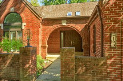 Grand entry outside with a double door and private walled courtyard | Image 2