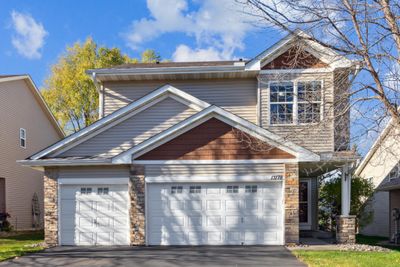 Welcome to this spacious 3 bedroom 4 bathroom 3 car garage home in Coon Rapids! | Image 1