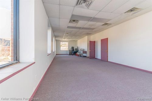 107 S Main St, Almont, MI, 48003-1067 | Card Image