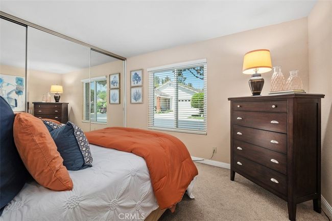 Here is look at the front bedroom complete with mirrored wardrobe doors | Image 8