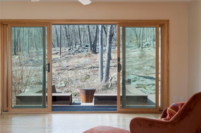 Doorway to outside with wood finished floors | Image 8