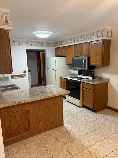 15542 Frederick Dr, Clinton Township, MI, 48038-1868 | Card Image