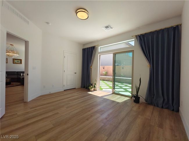 Bedroom downstairs with en-suite full bathroom | Image 19