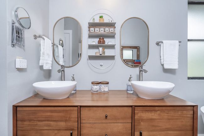 Bathroom featuring double vanity and a sink, all updated in Seller's Update List in docs. | Image 19