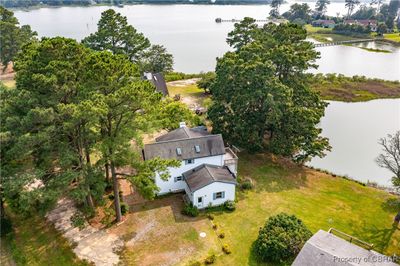 Bird's eye view featuring a water view | Image 2