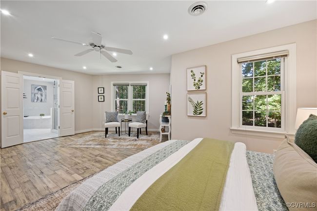 Primary bedroom with sitting area | Image 18