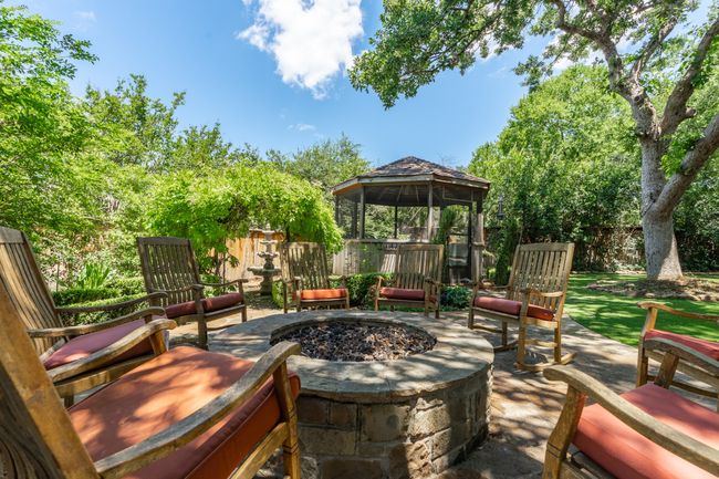 Fire pit near gazebo in backyard | Image 34