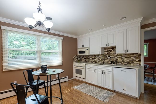 electric flat top stove, recessed lighting and crown molding | Image 10