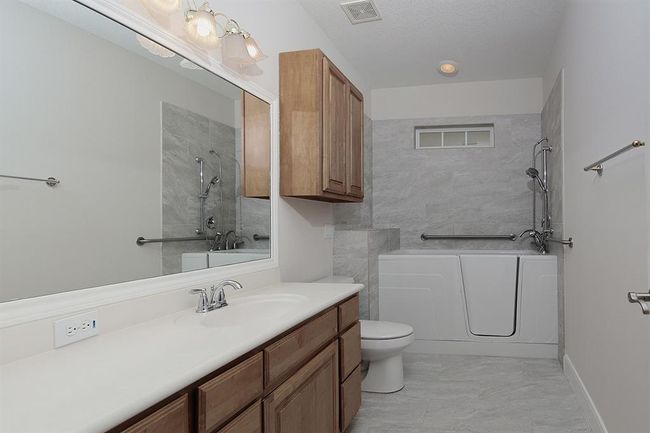 Secondary Bathroom #3 with walk-in tub and shower | Image 22