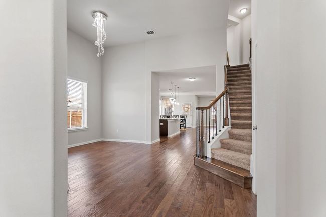 Foyer featuring a wealth of natural light, and wood-style flooring | Image 4