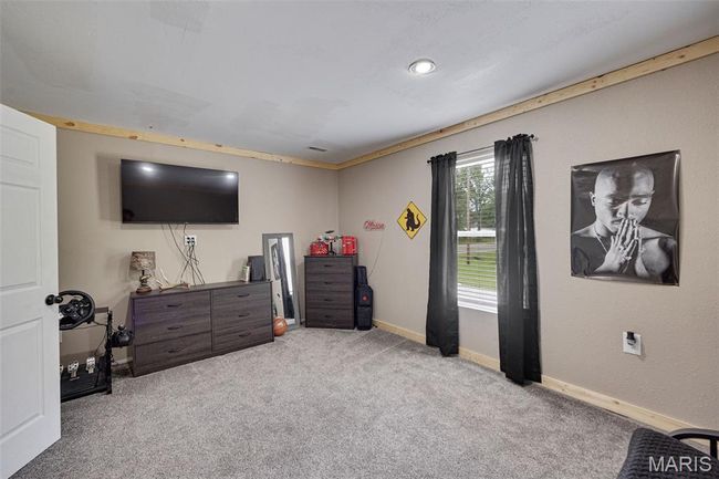 Bedroom with carpet floors, baseboards, and recessed lighting | Image 14