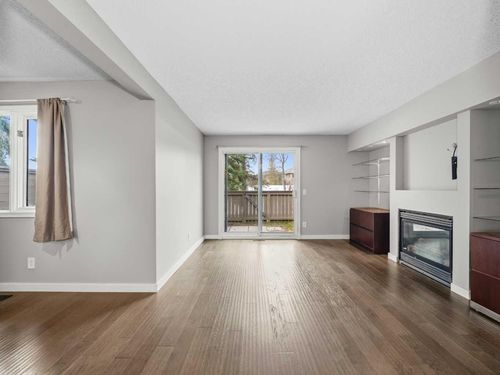 202-829 Coach Bluff Cres Sw, Calgary, AB, T3H1B1 | Card Image