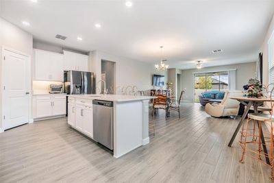 Beautiful tile plank flooring throughout enite home | Image 3