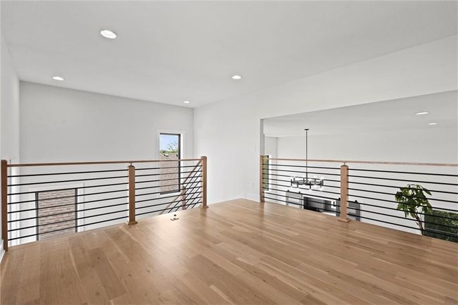 Spare room featuring recessed lighting and wood finished floors | Image 27