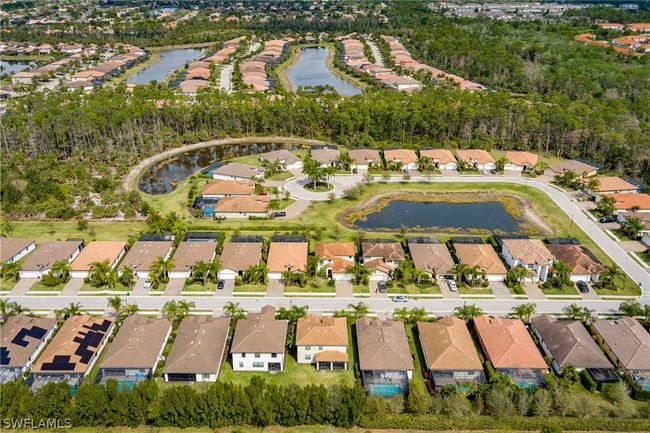 Birds eye view of property with a water view | Image 40