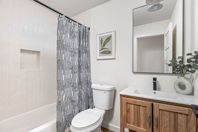 Full bathroom with vanity and shower / bath combo | Image 22