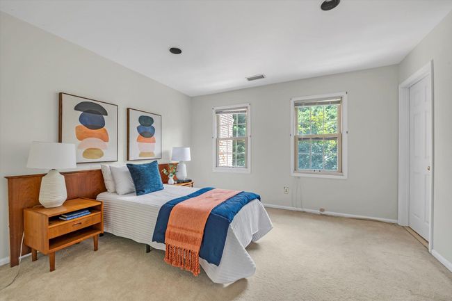 Bedroom with light carpet and baseboards | Image 14