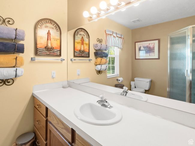 Bathroom featuring a stall shower | Image 10