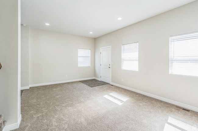 Empty room featuring carpet floors and recessed lighting | Image 25