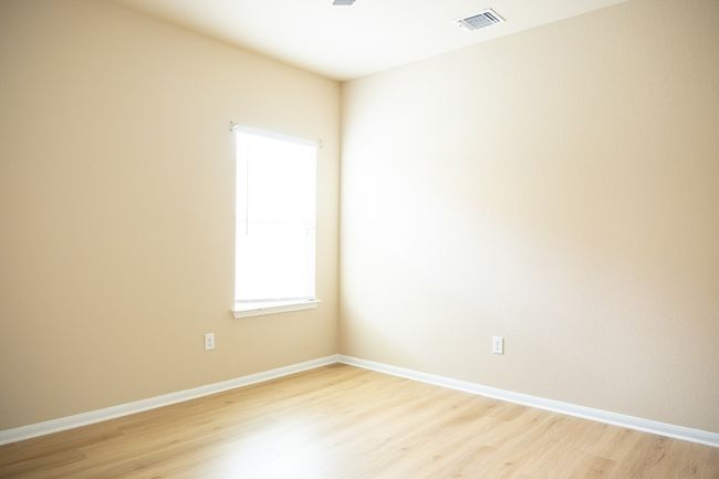 Unfurnished room with light wood-type flooring and baseboards | Image 18