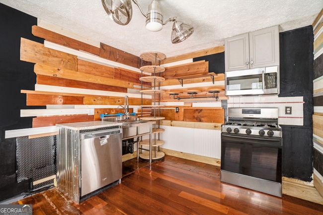 1213 Laurel Cliff Dr Se, House other with 4 bedrooms, 3 bathrooms and 3 parking in SMYRNA GA | Image 9