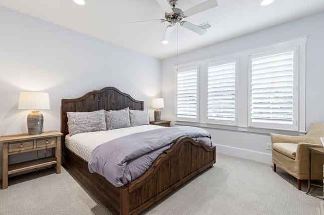 Carpeted bedroom featuring baseboards, visible vents, recessed lighting, and a ceiling fan | Image 28